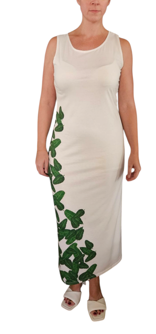 Women's midi casual beach and vacation dress it is white with green leaves going up the right side